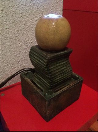 Fuente decorativa con luz