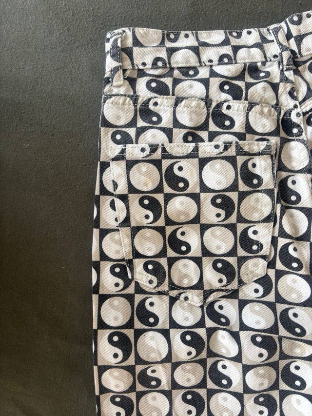 Jeans estampados yin yang vintage