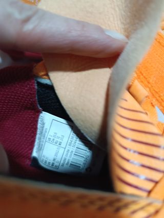 Zapatillas niño futbol.