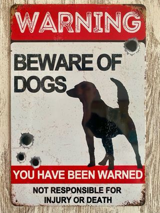 Cartel “cuidado con el perro”