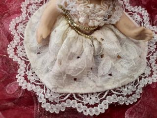 Mini bambolina in ceramica 