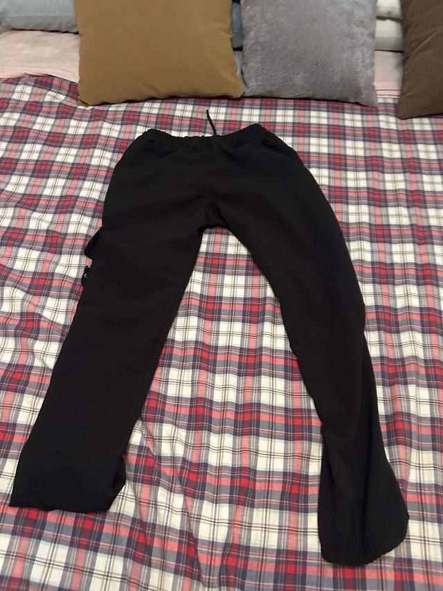 pantalones stone island negros