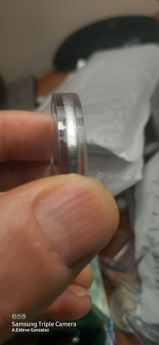 Moneda plata proof canto liso centenario,error