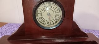 RELOJ MONTADO EN SOPORTE MADERA