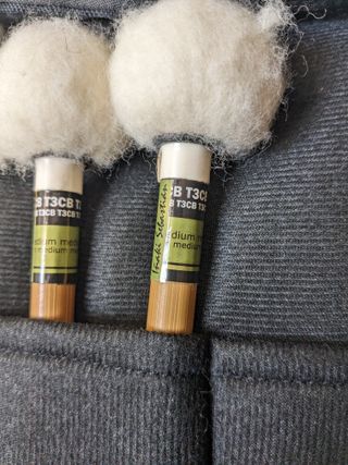 Baquetas timbal, caja, marimba y libro