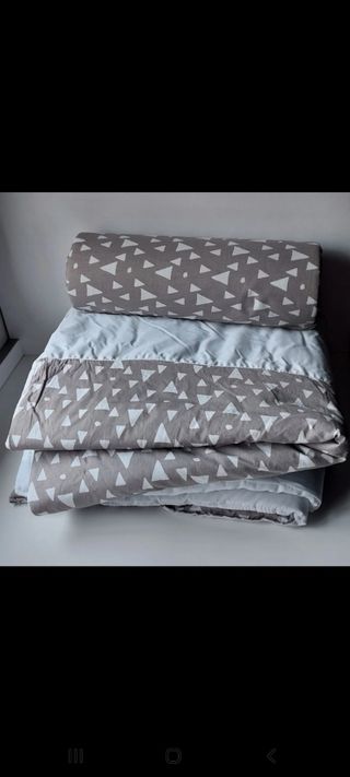 Colcha nordica cuna y cojin antivuelco