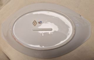 Antigua fuente de porcelana francesa con peces