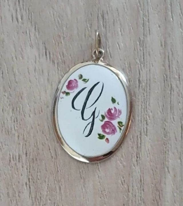 Pendente in argento placcato oro e ceramica