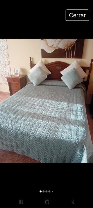 Colcha reversible rosa y verde y un mándala