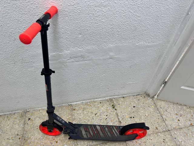 Patinete oxelo naranja fosforito