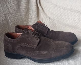 Zapatos picados de Frau