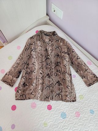 Camisa animal print. Talla S