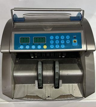 Máquina contadora y de detección de billetes falso