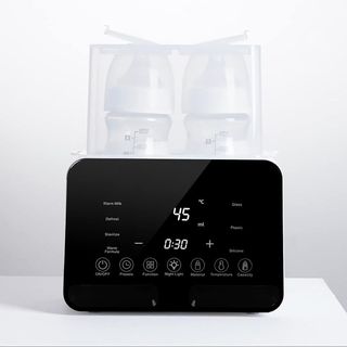 Esterilizador de biberones y calentador leche.