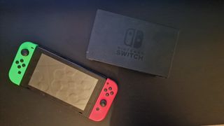 Nintendo Switch con 4 joycons y 2 juegos
