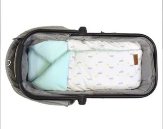 Arrullo capazo bebé