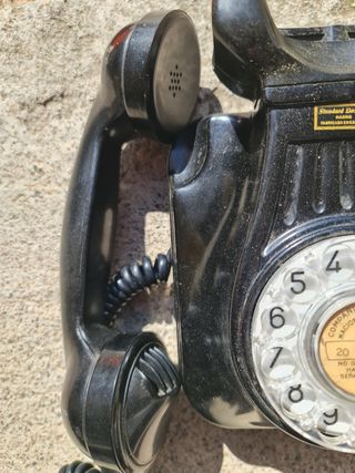 Teléfono vaquelita antiguo de pared