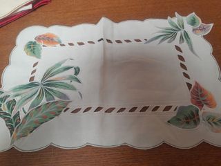 Strofinacci e borsetta ricamata