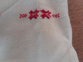 Strofinacci e borsetta ricamata