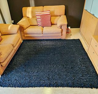 Alfombra lana negra