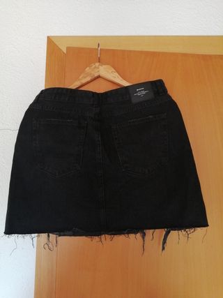 Falda corta tejana negra mujer. 