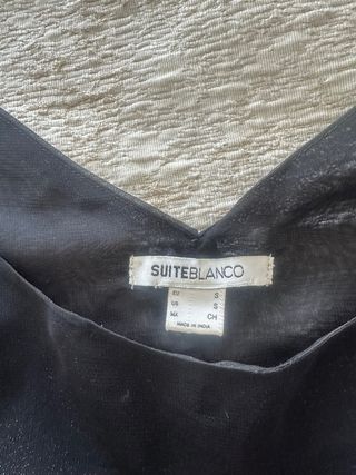 Blusa negra tranparente con brillos