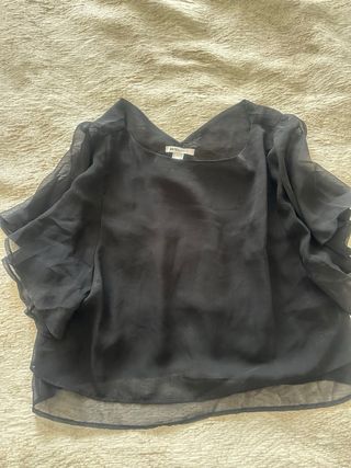 Blusa negra tranparente con brillos