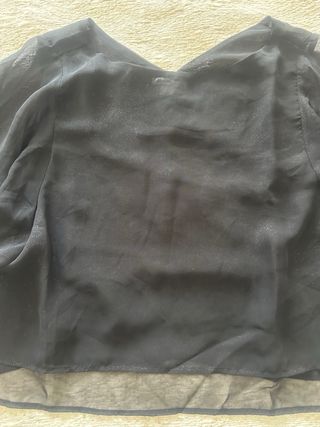 Blusa negra tranparente con brillos