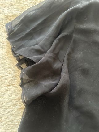 Blusa negra tranparente con brillos