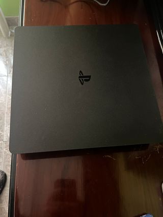 PlayStation 4 Slim 1TB + Mando + 2 Juegos
