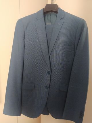 Traje