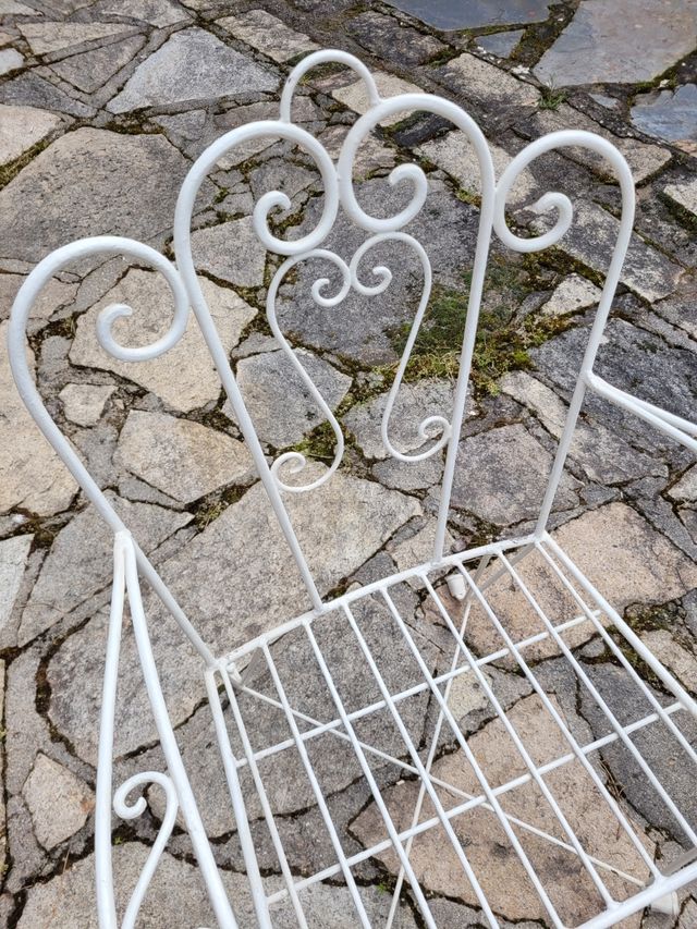 Sillas de forja con reposabrazos de jardín