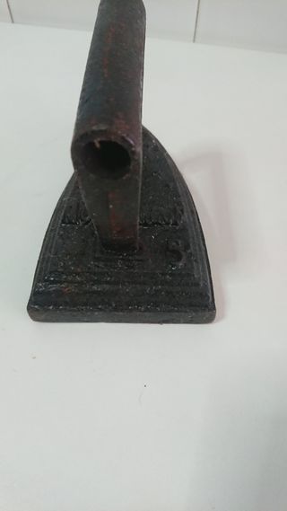 Plancha antigua de hierro.