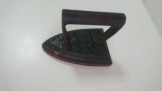 Plancha antigua de hierro.