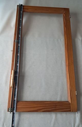 2 HOJAS DE VENTANA CON CRISTALES.    SIN MARCO.