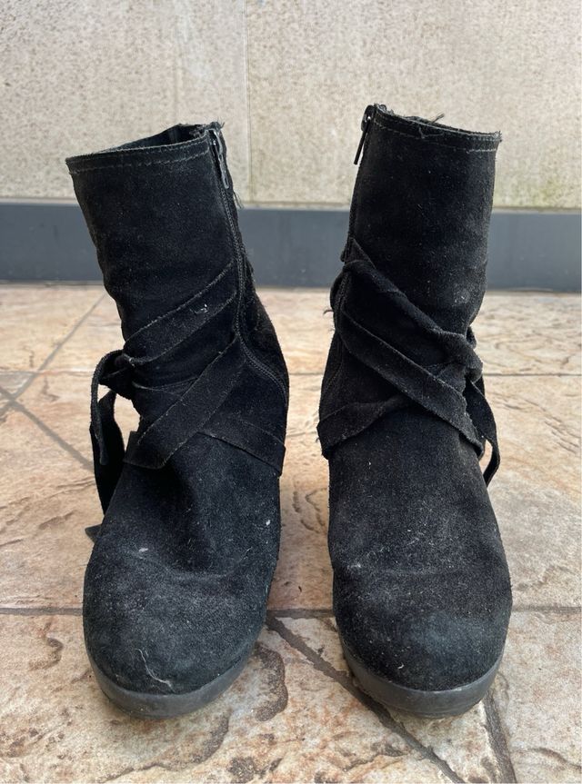 Botas negras de piel