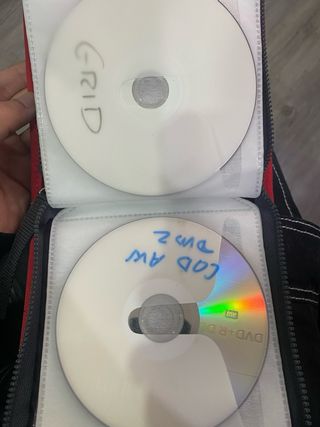 Xbox 360 con dos mandos y juegos