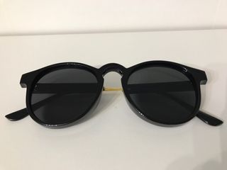 Gafas de sol redondas negras