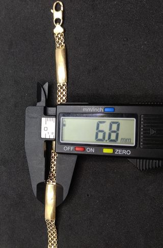 Pulsera Bismark oro de 18k, 11.4 gr, 20cms.