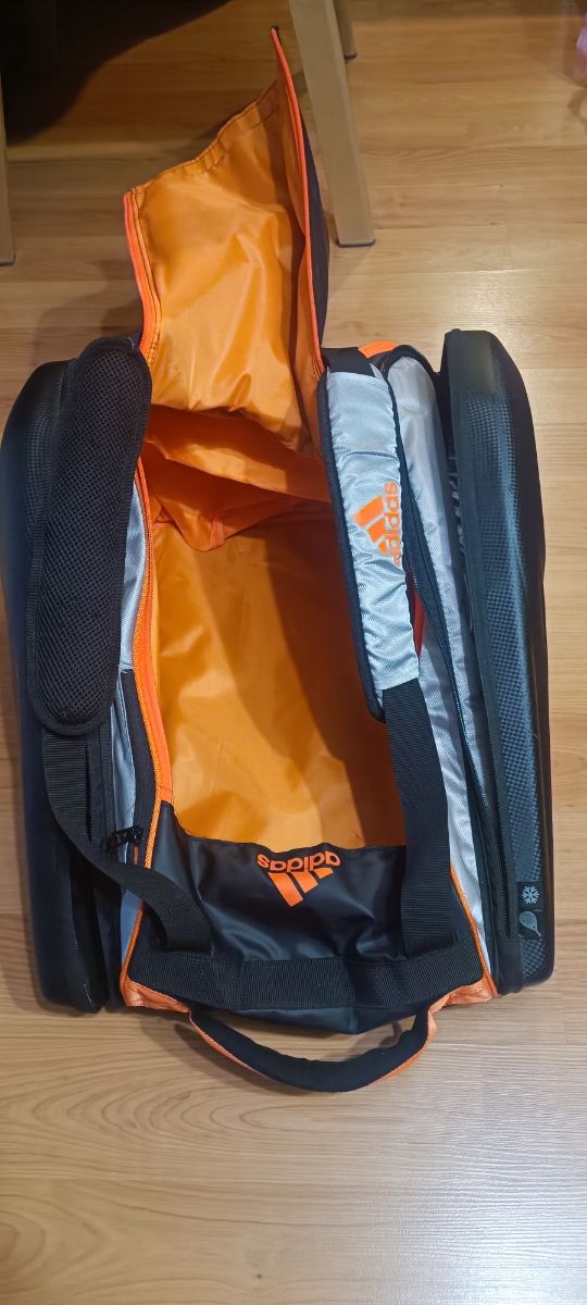 Paletero Adidas naranja y negro