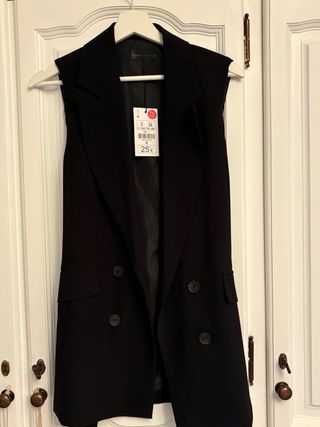 americana larga sin mangas negra