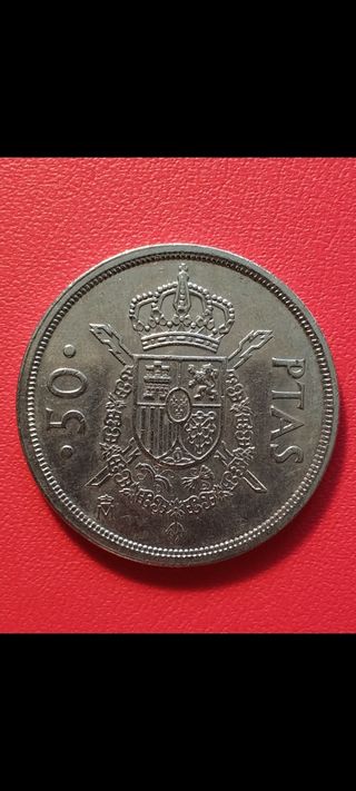 Antigua moneda de D Juan Carlos I.