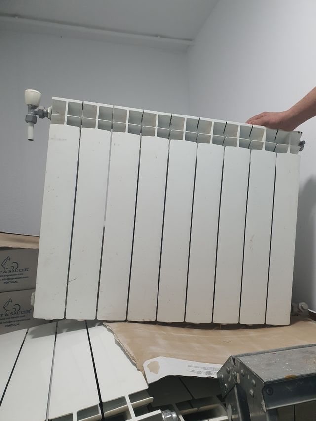 Caldera Baxi con radiadores y toallero