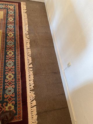 Antigua alfombra de LANA