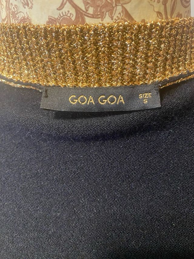 Rebeca de señiora negra y dorada marca Goa Goa