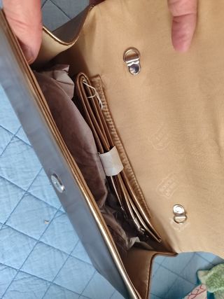 Cartera de mano dorada fiesta