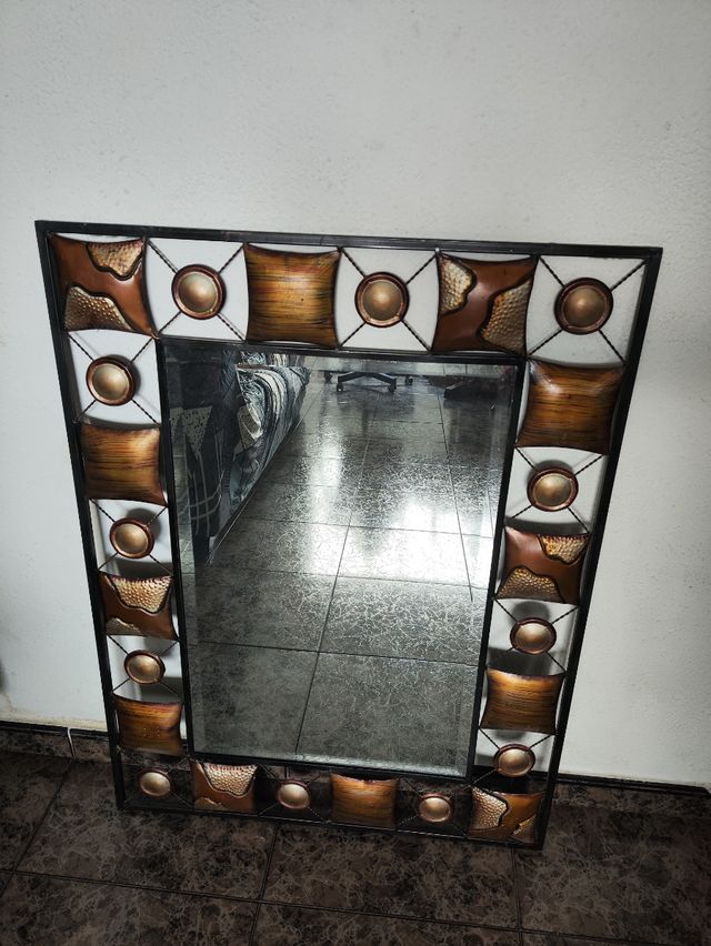 Espejo forjado