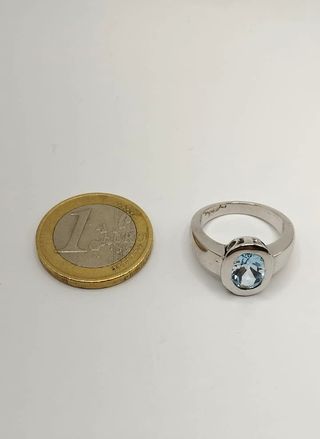 Anillo oro blanco con topacio 