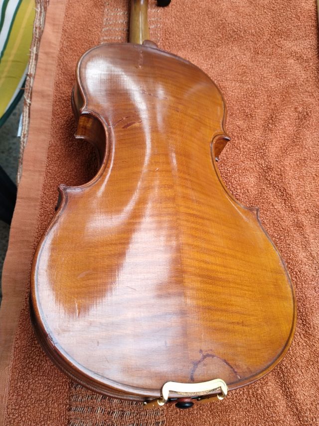 Violín, arco y estuche