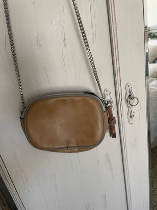 Bolso parfois la crwmallera central se abre mal